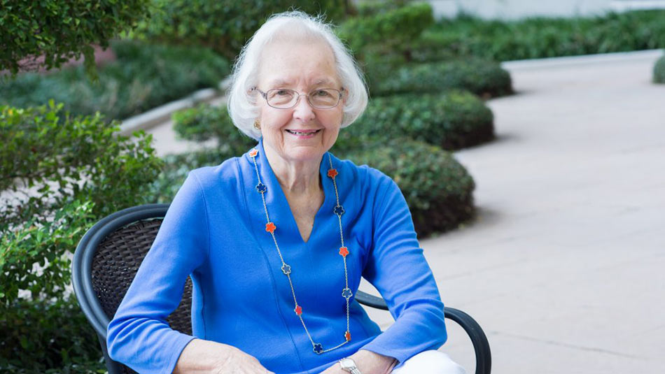 portrait of Helen Gilbart in a blue shirt