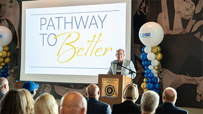 Rich Warshof, Co-Chair of the Pathway to Better campaign speaking at a gathering of people celebrating the college's 98th anniversary at the Tarpon Springs Campus