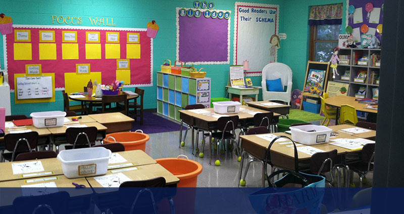 early childhood classroom with desks and art materials