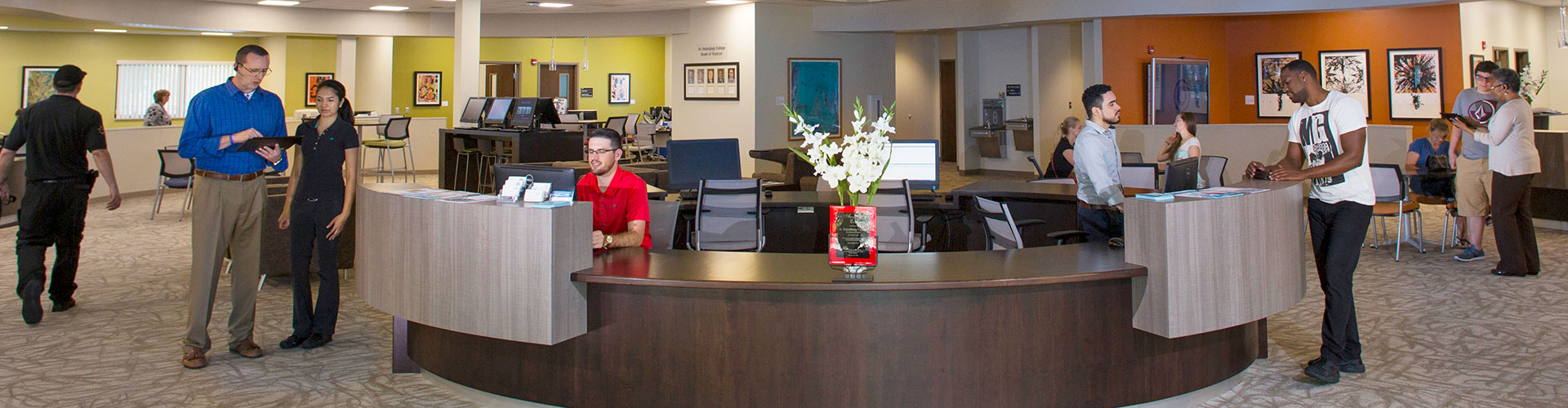 SPC campus lobby with people interacting